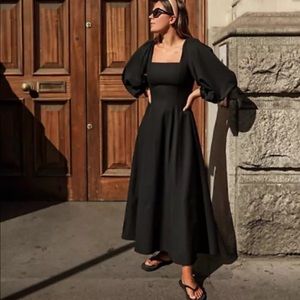 zara midi dress with voluminous sleeves